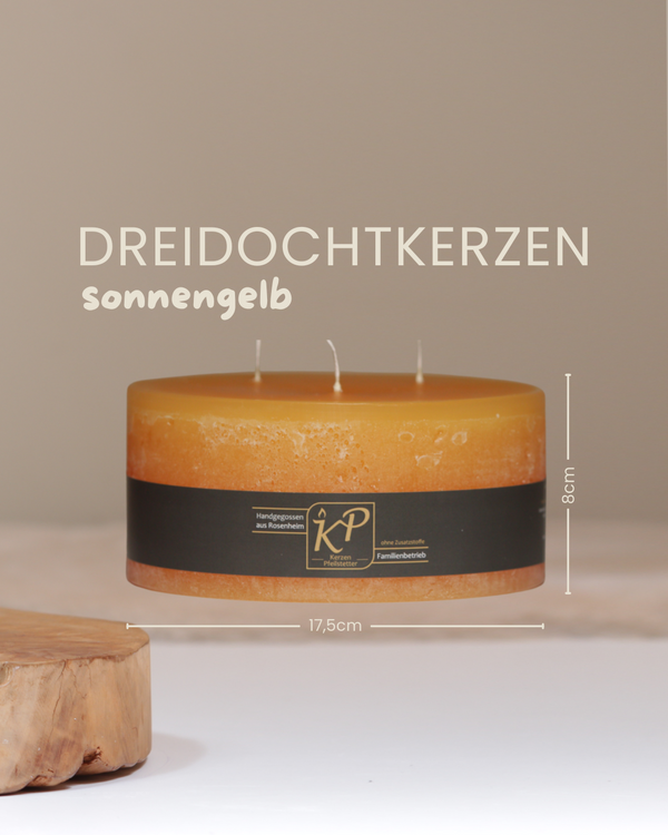 Dreidochtkerze in sonnengelb mit Angaben zu Höhe und Durchmesser.